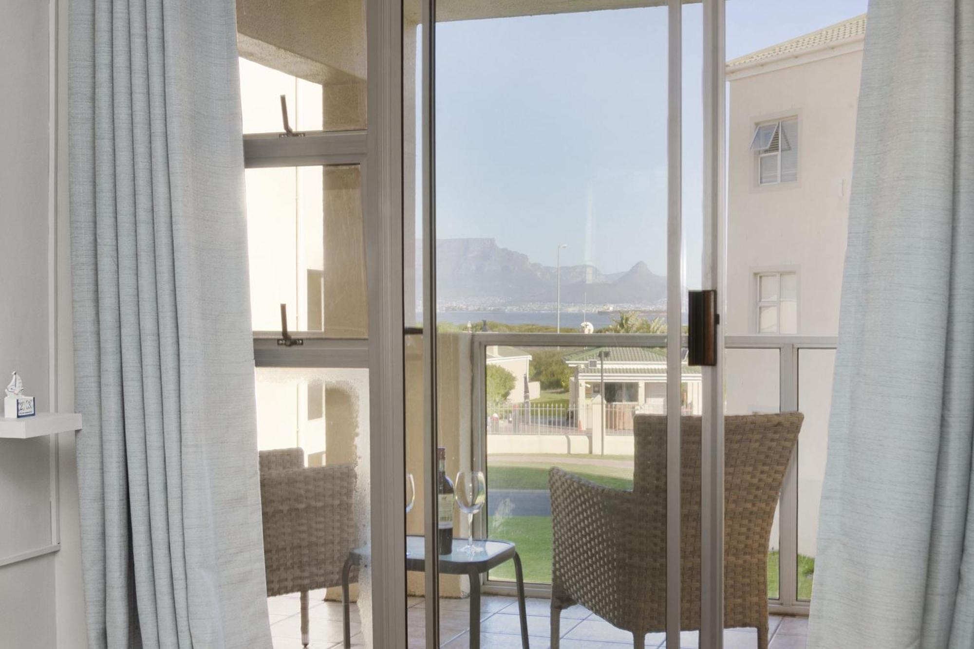 Big Bay Beach Club 122 By Hostagents Apartment Bloubergstrand Bagian luar foto